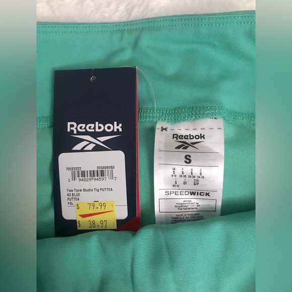 Reebok Two-Tone Studio Leggings
Size: Small 
Color: Future Teal - Picture 10 of 10